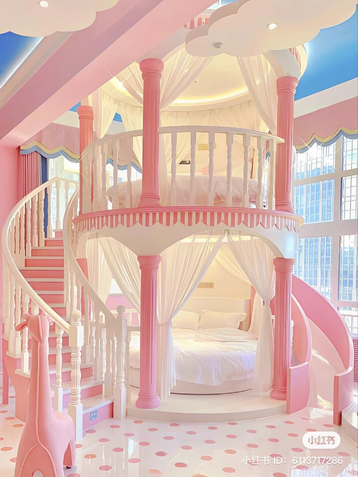 a pink and white bedroom with a spiral staircase leading up to the second story bed