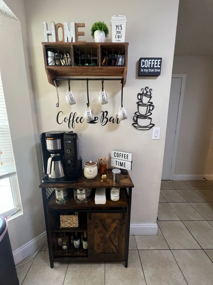 the coffee bar is located in the corner of the room with two shelves above it