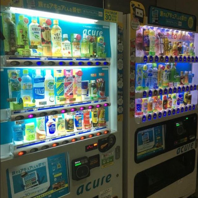 two vending machines with drinks on them