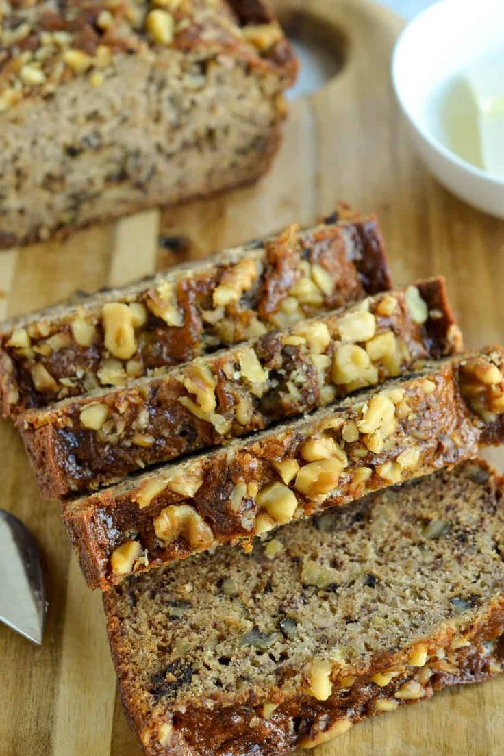 slices of banana nut bread on a cutting board