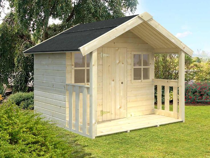 a small wooden shed with the door open and windows on it's side, in front of some bushes