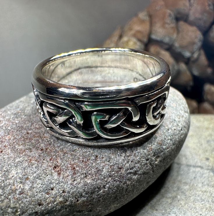 Solid Sterling Silver Celtic Knot Ring with Celtic Knotwork. The Celtic Knot is a traditional Irish design going back hundreds of years. The symbolism of the over & under loops has been used on jewelry by the Irish people and exhanged by loved ones for centuries. The traditional Celtic Knot can be used to honor a friendship and a love between family, friends and partners. People would often have Celtic knotwork on their jewelry to make it an extra special gift. The never ending lines of the knot Irish Wedding Rings, Jewelry To Make, Celtic Ring, Irish Design, Celtic Knot Ring, Celtic Knotwork, Celtic Rings, Irish Jewelry, Irish Traditions