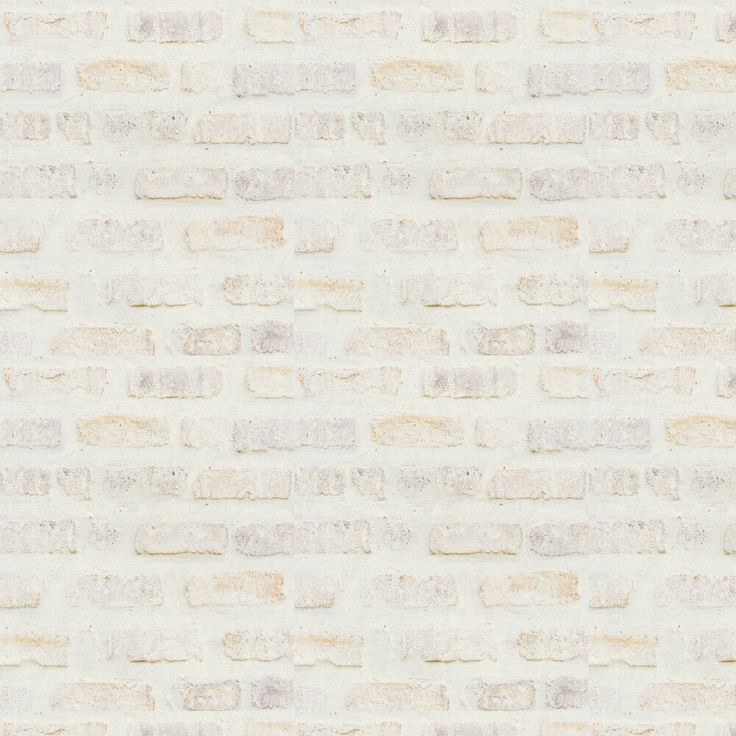 a white brick wall textured with light brown bricks