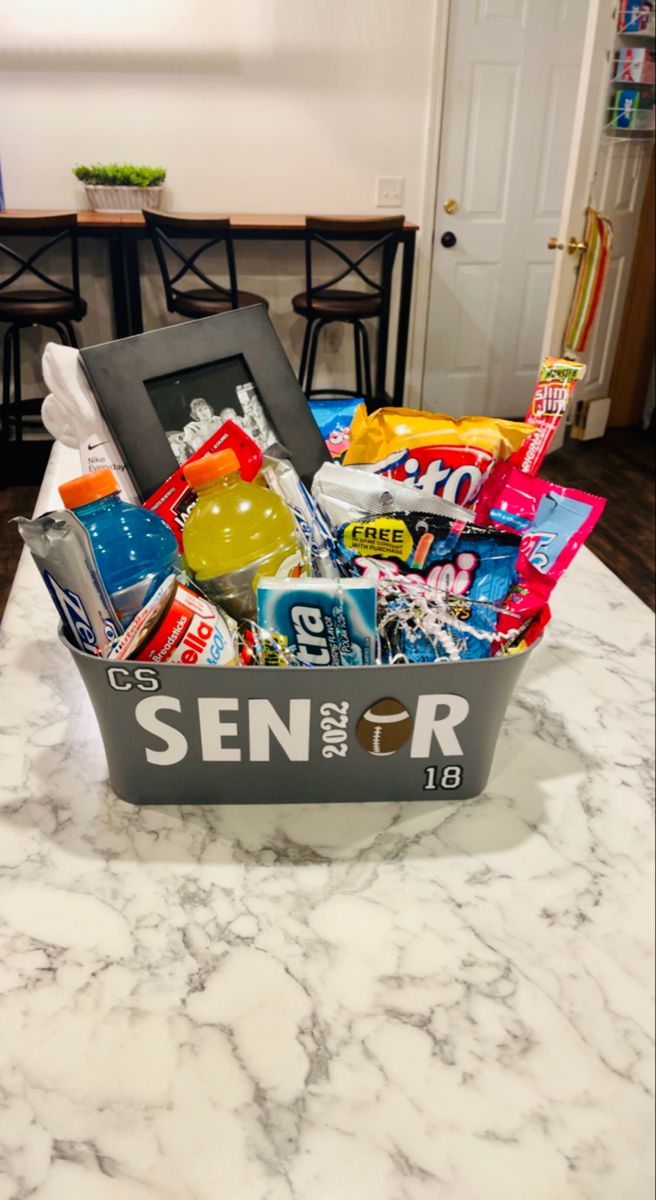 a basket filled with snacks sitting on top of a counter