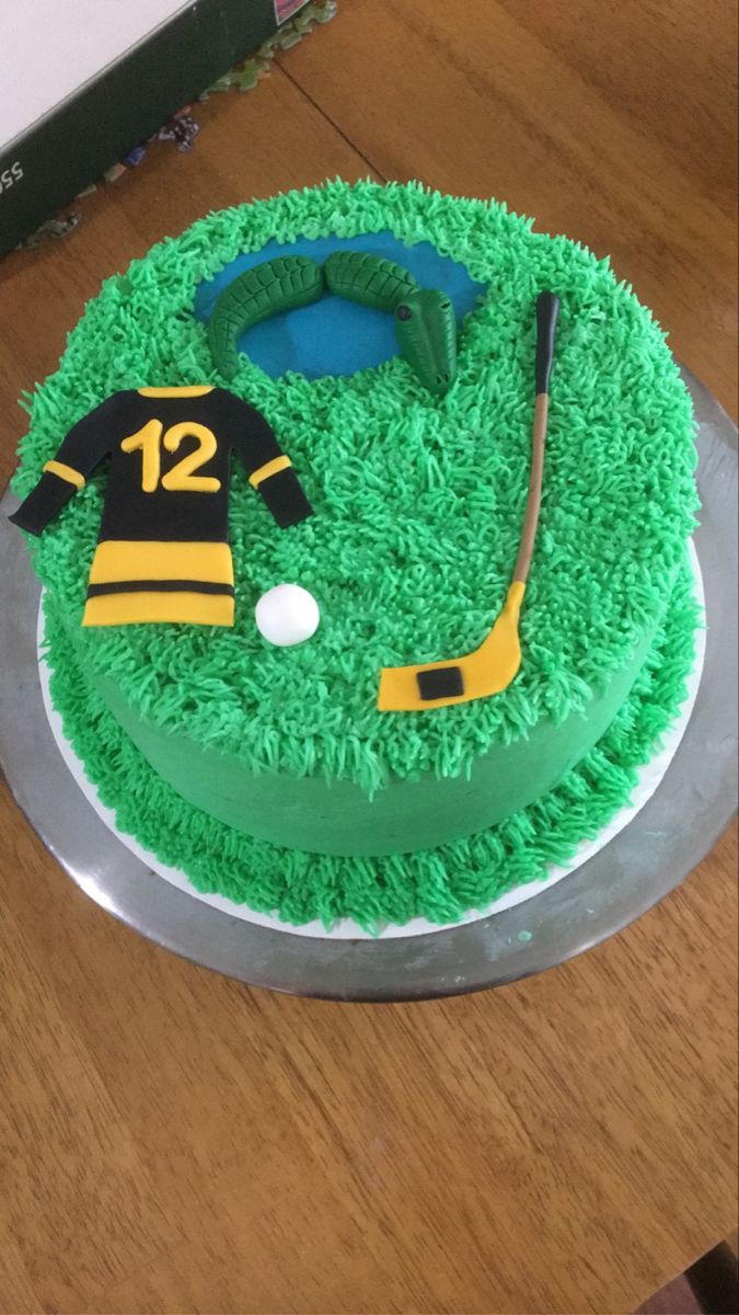 a cake that is shaped like a golf course