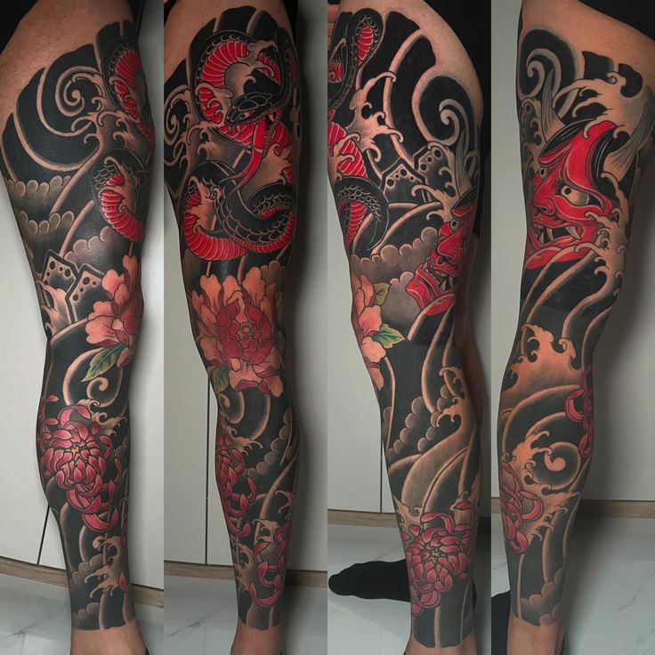 the legs are covered in black and red ink with dragon tattoos on them as well as flowers