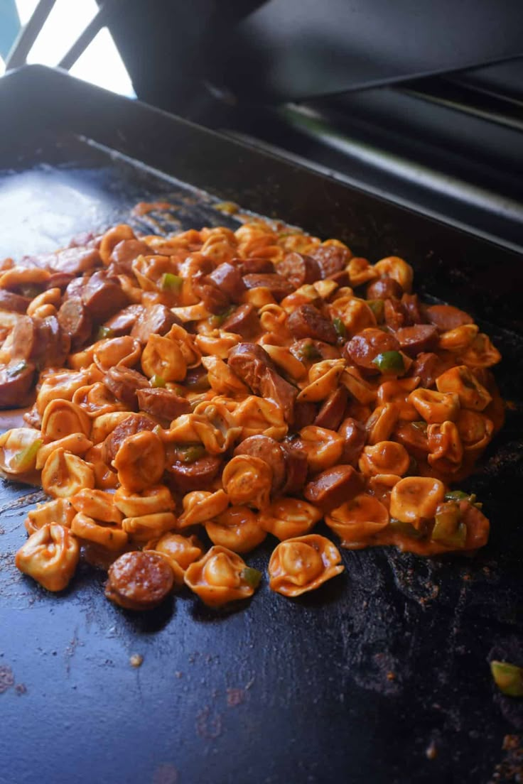 the food is being cooked in the oven on the stove top and ready to be eaten