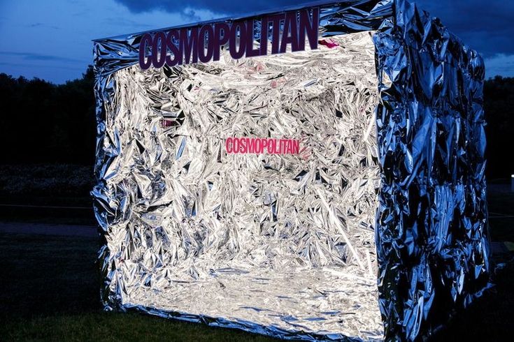 a large piece of tin foil with the word consumption on it's side in front of a dark sky