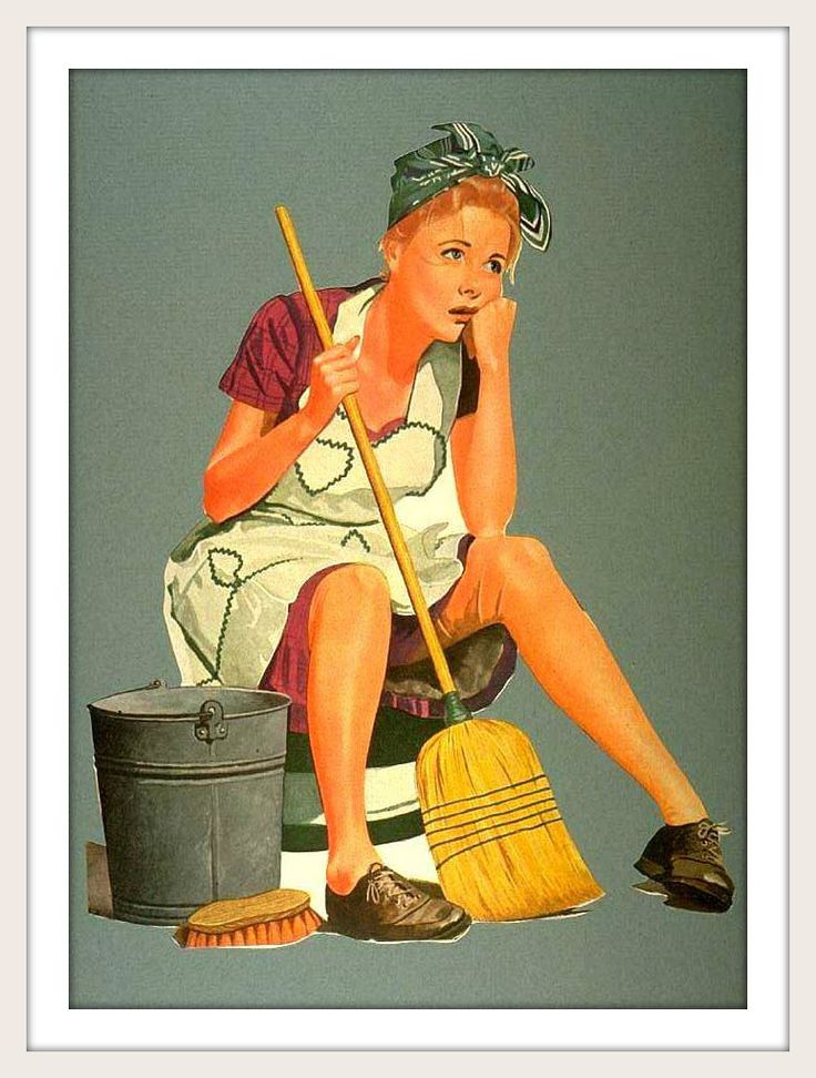 a woman sitting on the ground with a broom and bucket