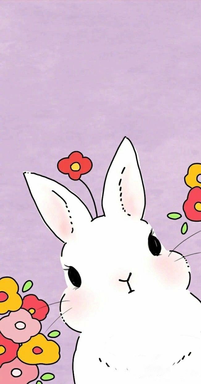 a white rabbit with flowers in the background