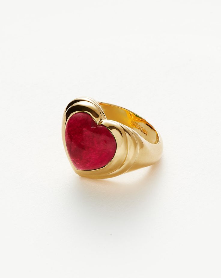 Jelly Heart Gemstone Ring | 18ct Gold Plated/Pink Quartz gold/pink. Share the Love. The Chubby Jelly Heart Gemstone Ring is Set with a Dyed Pink Quartz Cabochon Stone – Known for Bringing Love – Surrounded by Signature Ridge Detailing on a Domed Band. Wear Solo or Stack with Other Chunky Pieces. This Piece Contains a Semi-Precious Gemstone that is Natural, Meaning Each Stone is Completely Unique. There May be Variations in the Patterns, Colour Hues and Size Because of This. Metal: 18Ct Recycled Gold Plated on Brass Gemstone: Pink Quartz Dimensions: 20mm X 17mm Stone Height: 7mm Weight: 9. 5g Product Code: Msg-G-R1-Pq Please Note: Our Gemstones are Naturally Sourced and May Vary in Colour. Jelly Hearts, Double Chain Bracelet, Semi Precious Gems, Chunky Rings, Heart Gemstone, Pink Quartz, Coin Necklace, Precious Gems, Ring Size Guide