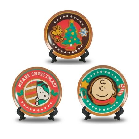 three christmas plates with cartoon characters on them