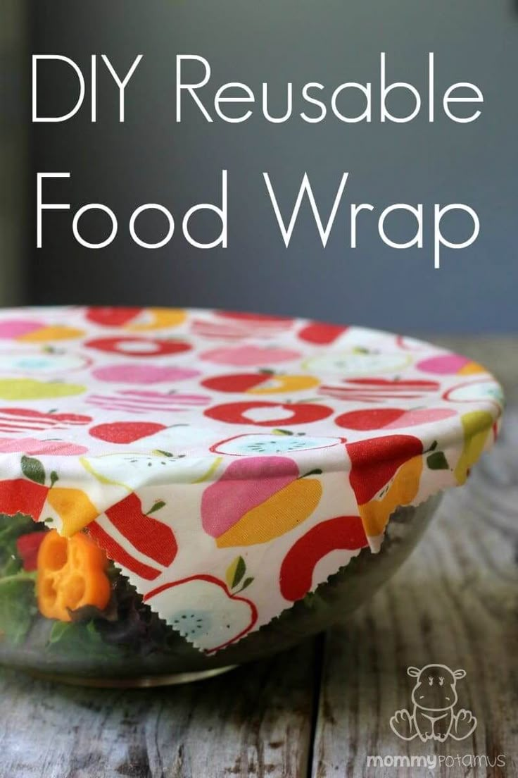 a glass bowl filled with food wrap on top of a wooden table and the words diy reusable food wrap