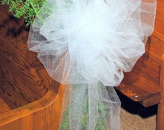 a bride's bouquet is sitting on a chair