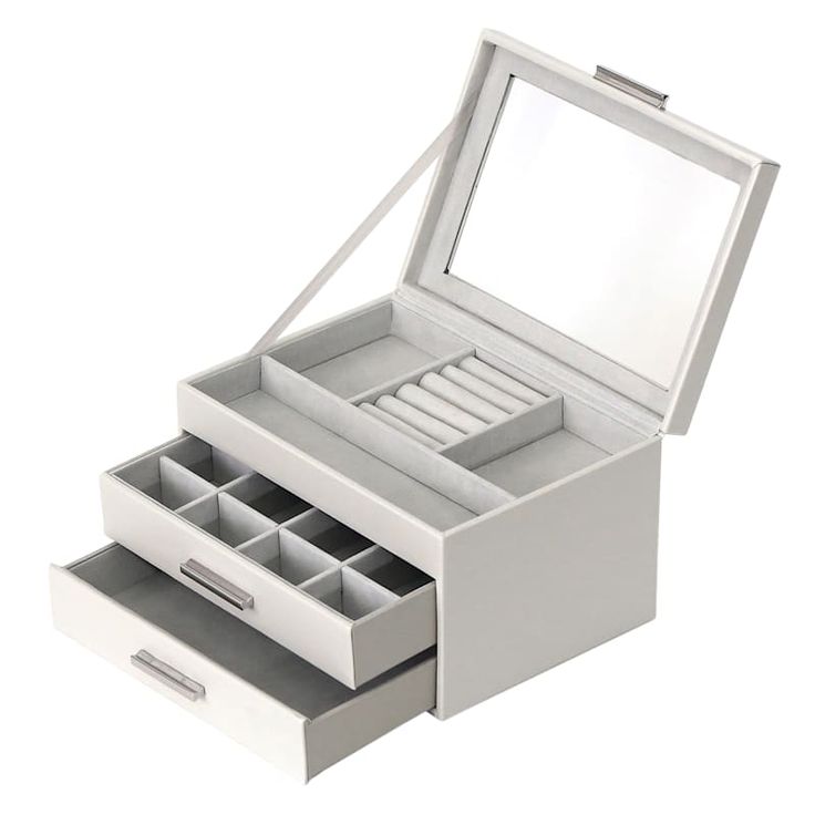 an open white jewelry box with drawers