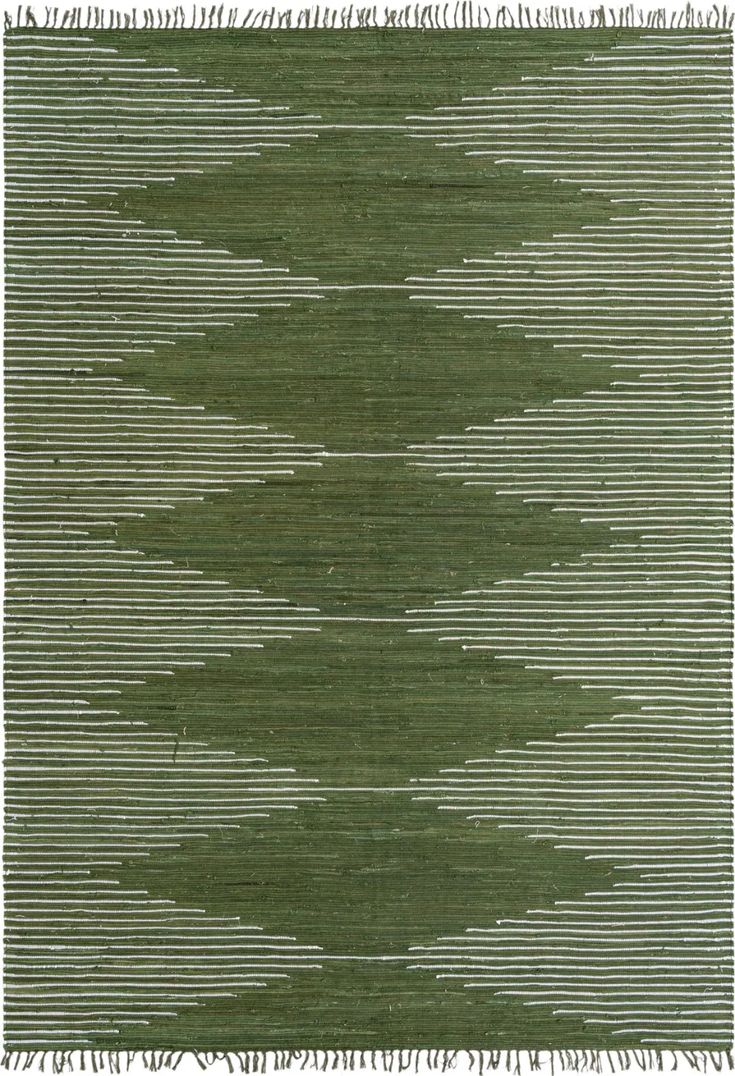 an area rug with green and white stripes