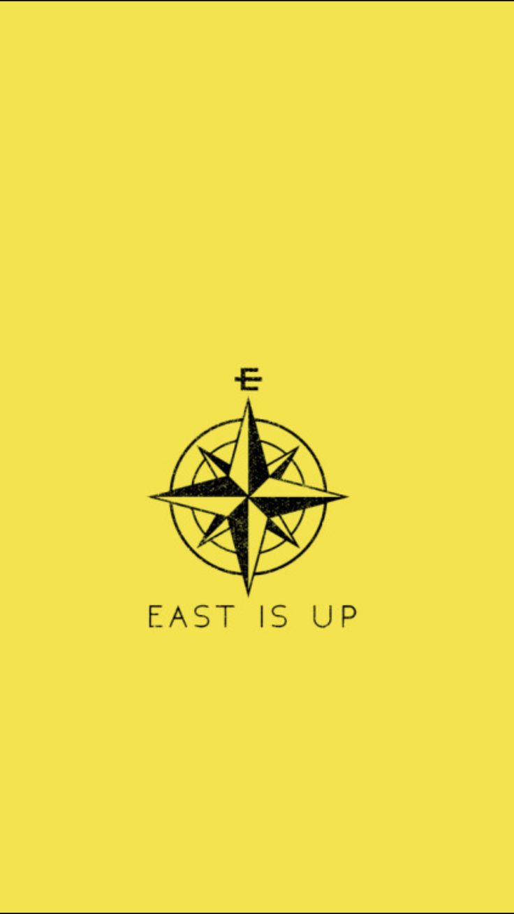 the logo for east is up, which features an image of a compass on it