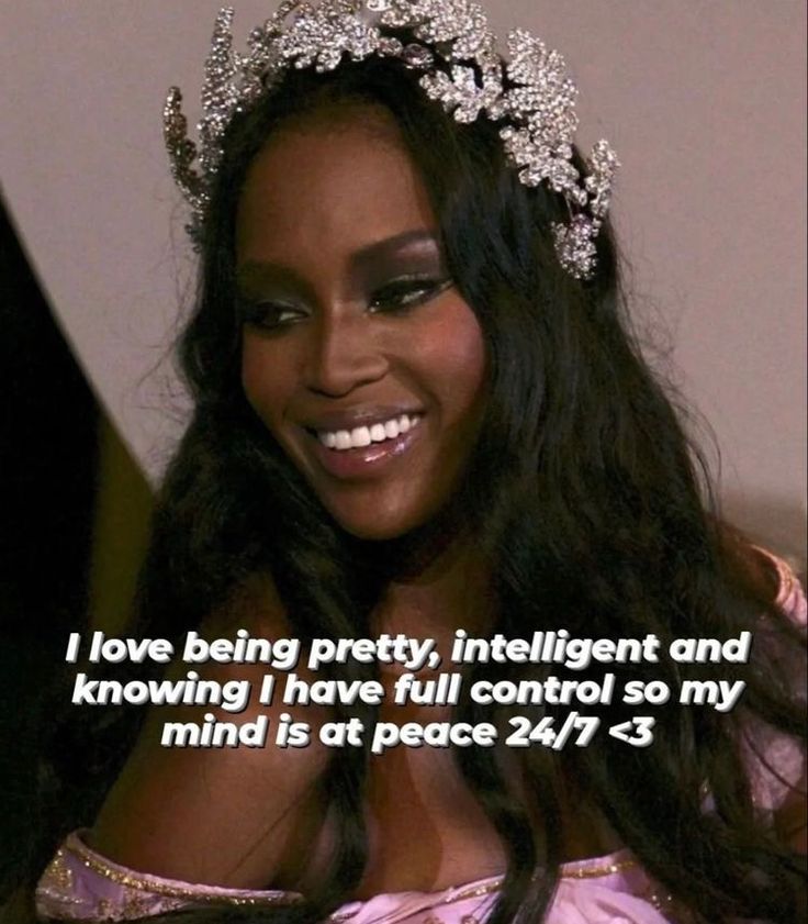 a woman wearing a tiara and smiling at the camera with a quote on it