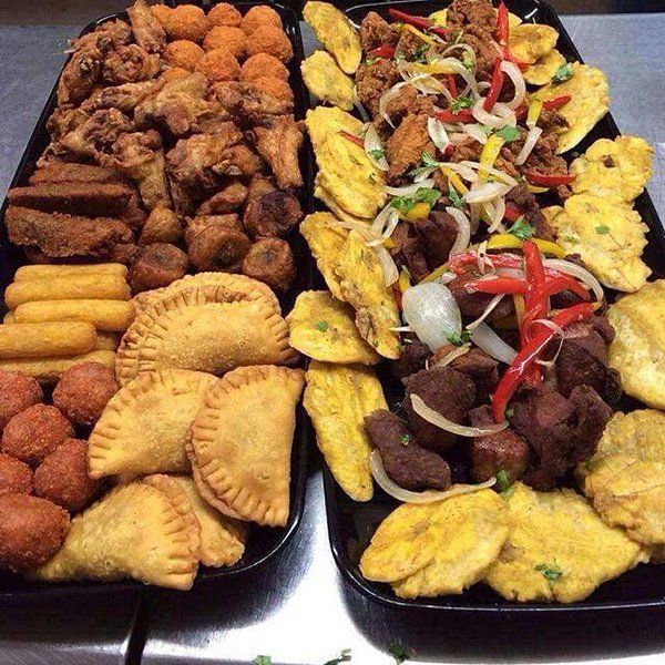 two trays filled with different types of food