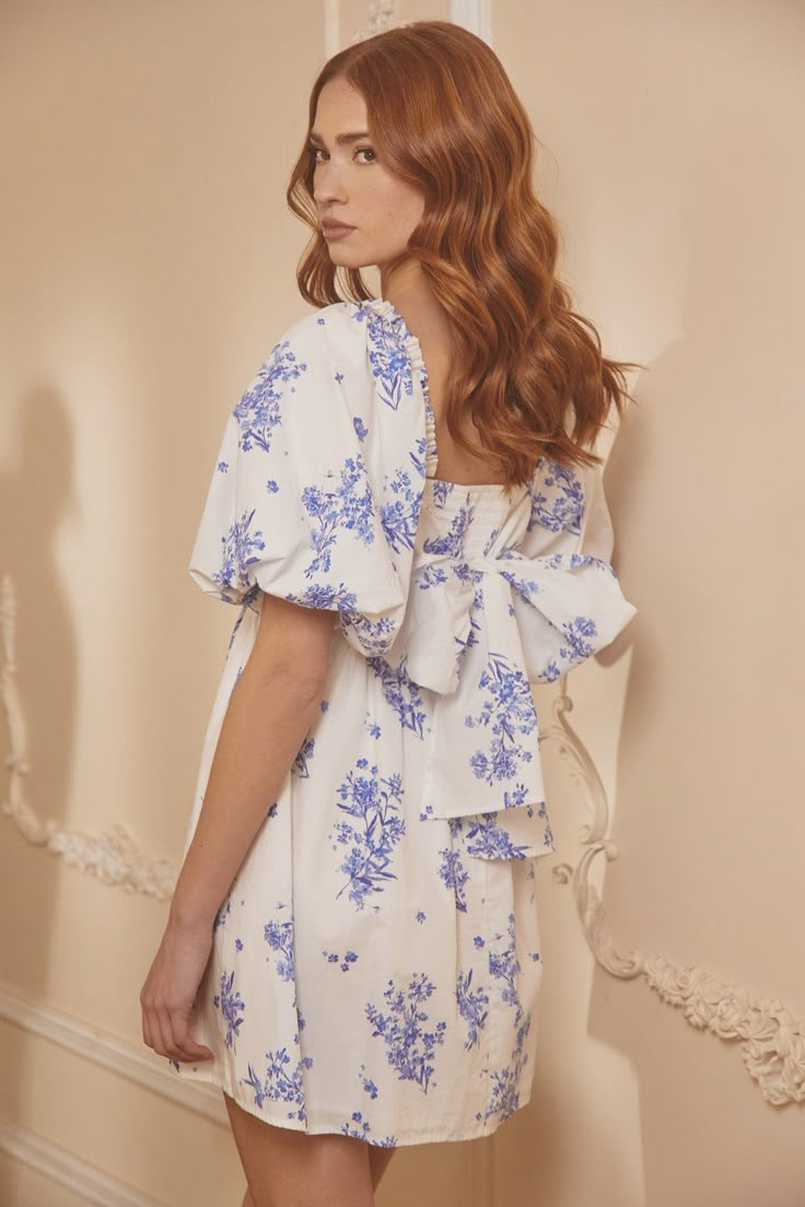 Whether you're sipping tea or rehearsing for the big day, this dress is your go-to. With oversized puff sleeves that pack a punch, they frame a square neckline and a fitted bodice with princess seams. Just below, a flared mini skirt creates a balanced feel, while the back features smocking with a large tie design. Take the look from casual to dressy and swap out the shoes. Pair it with your favorite jewelry for a completed fun look.- Oversized sleeves- Smocked back- Tie back detail- Poplin- Colo White Puff Sleeve Dress, Graduation Dresses White, Sunday Dresses, Blue And Yellow Dress, Puffy Sleeve Dress, Bow Back Dress, Flared Mini Skirt, Babydoll Mini Dress, Brunch Dress