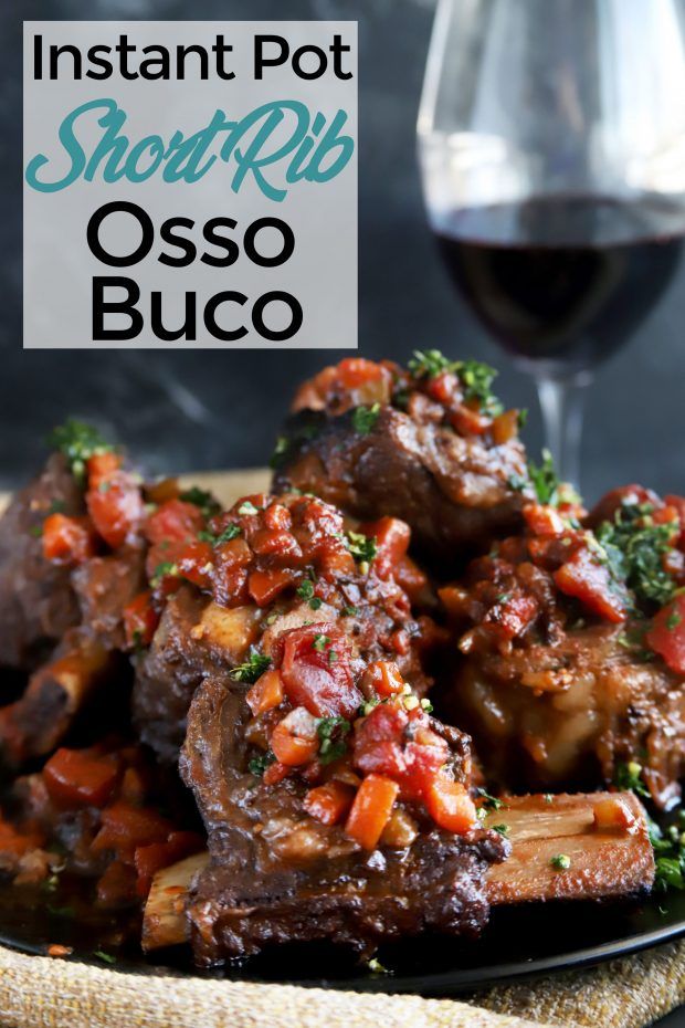 a close up of food on a plate near a glass of wine with the words instant pot short rib osso buco