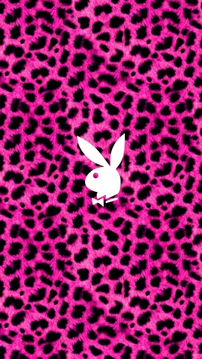 a pink and black animal print wallpaper with a white rabbit on it's face