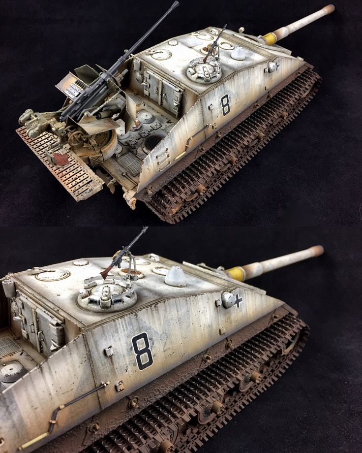 two model tanks with numbers on them