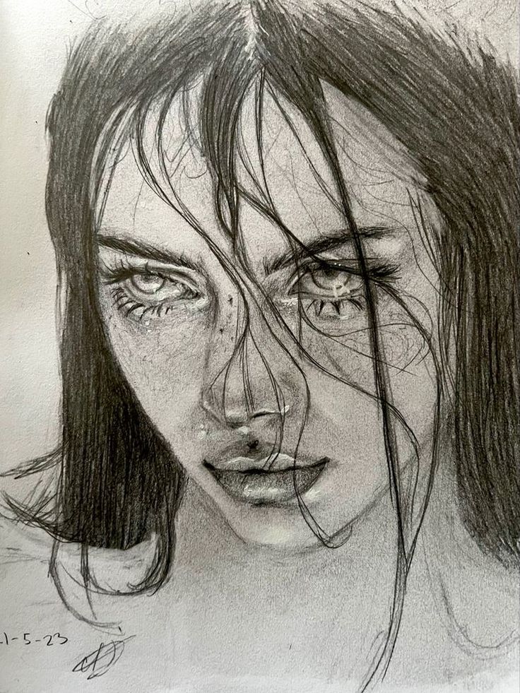 a pencil drawing of a woman's face