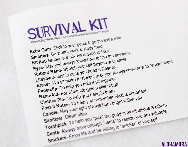 a white piece of paper with the words survival kit written in purple and black on it