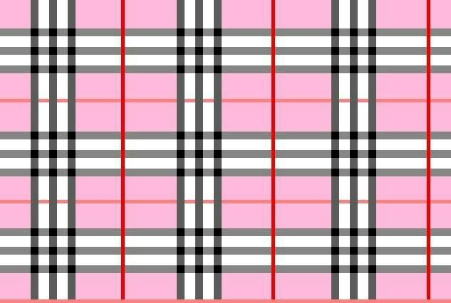 a pink and black plaid pattern with red accents on the bottom right hand corner,