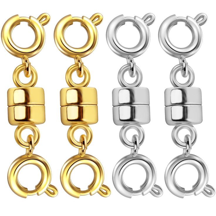 four pairs of gold, silver and black metal clasps with rings on each side