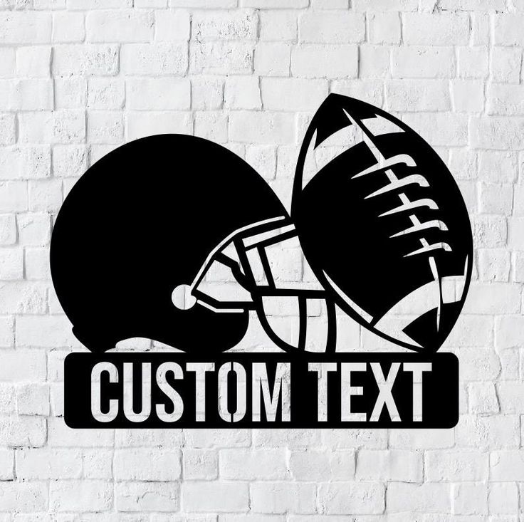 a football helmet with the word custom text on it in front of a brick wall