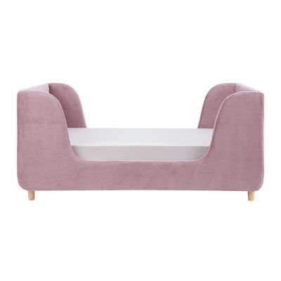 a pink couch with a white mattress on it's back and legs, in front of a white background