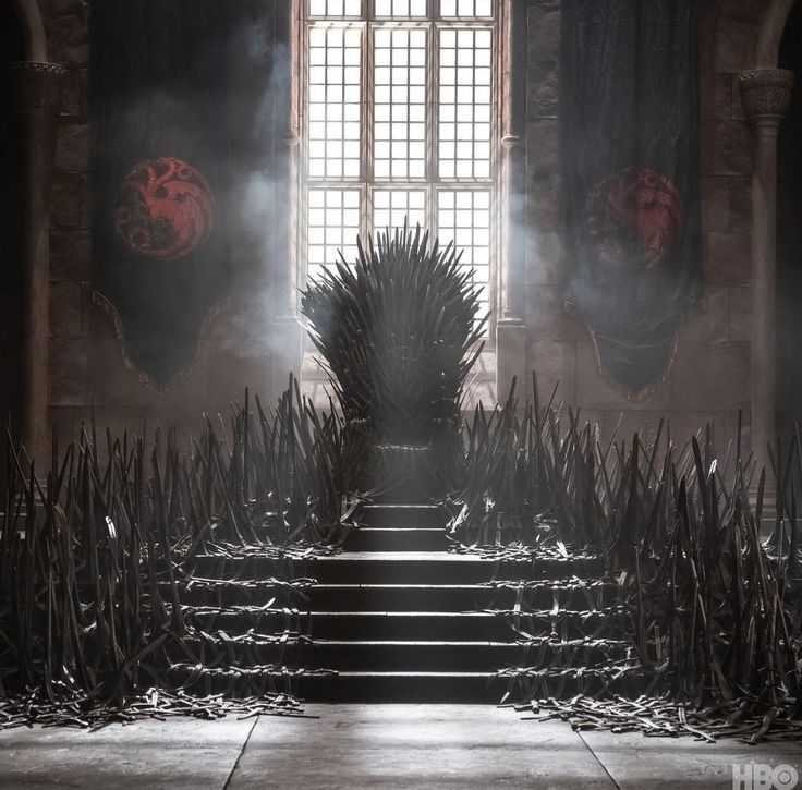 the iron throne sits in front of an open window