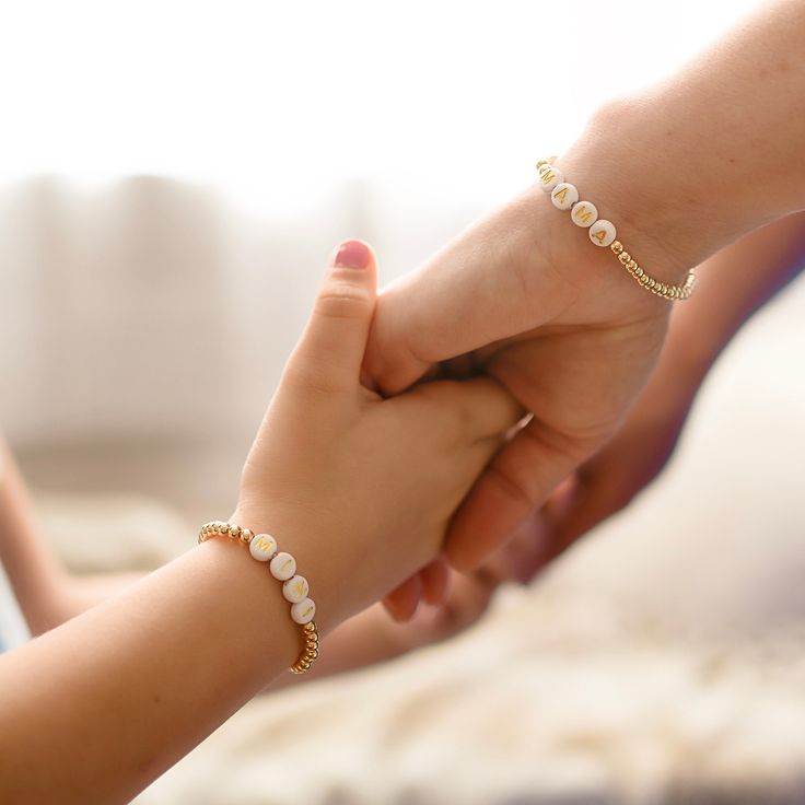 🔹This is a beautiful set of matching mother/daughter custom beaded bracelets. These make a perfect gift for a mama and daughter duo, or any ladies who want to show their special connection. Matching with your little is always fun and these dainty bracelets make dressing up even more special! In these weird and crazy times, it can be hard to feel connected with family and friends if we are separated by distance or by a quarantine. These simple little bracelets can help your little ones feel conn Mom And Me Bracelets, Mama And Me Bracelets, Mama And Mini Bracelets, Mommy And Me Jewelry, Beaded Jewelry For Friendship And Mother's Day, Beaded Jewelry For Friendship On Mother's Day, White Round Beads Friendship Bracelets For Mother's Day, Adjustable 8mm Beads Friendship Bracelets For Birthday, Adjustable Stackable Beaded Bracelets For Birthday