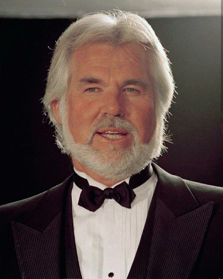 an older man wearing a tuxedo and bow tie with the words rest in peace