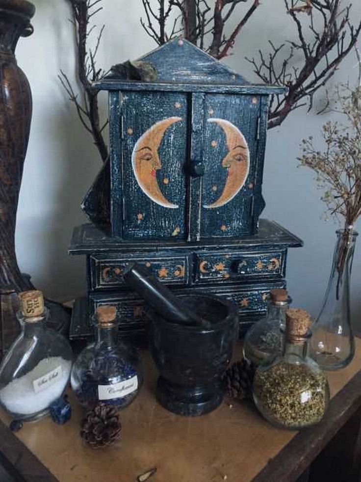 an old wooden table with various items on it