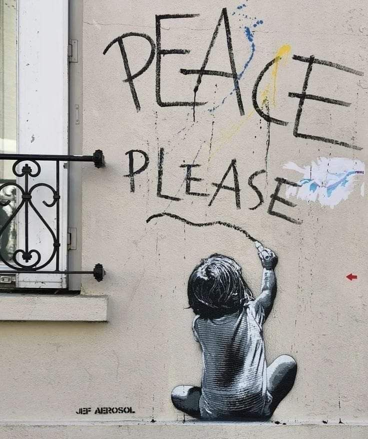 a painting on the side of a building that says peace please with a child holding a string