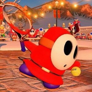 an animated character is playing tennis in mario kart