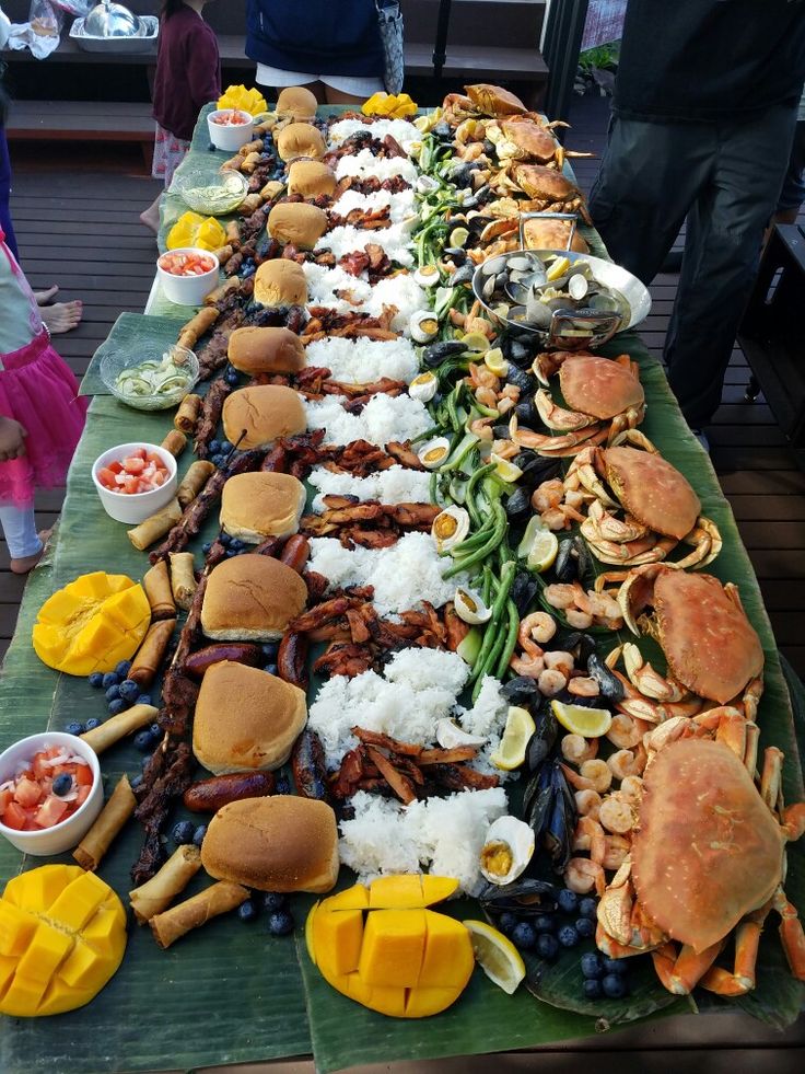 a long table filled with lots of food