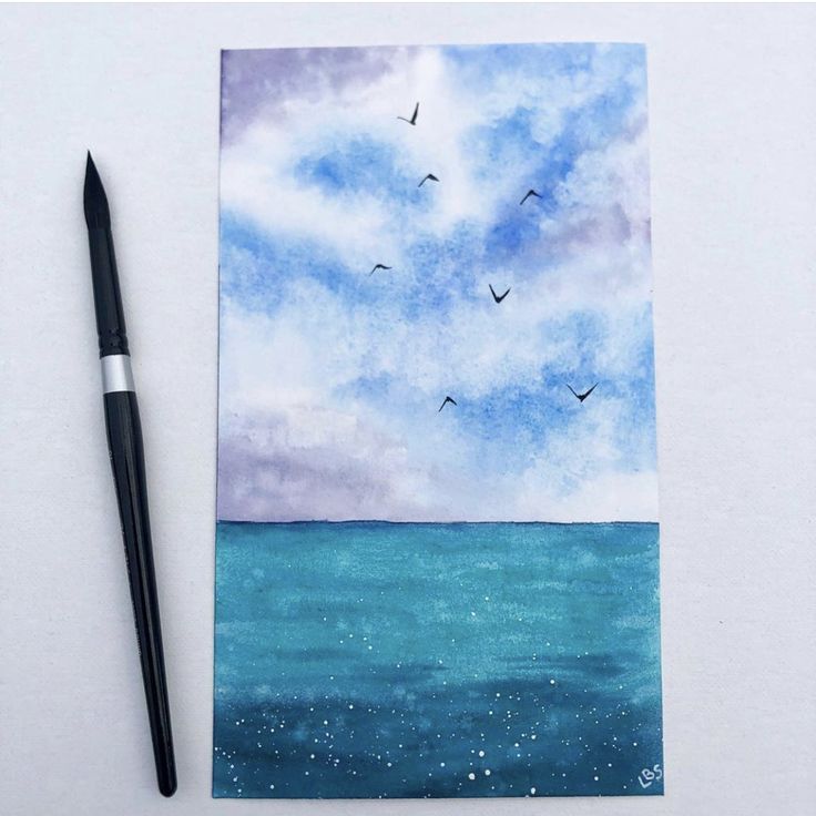 a watercolor painting of birds flying over the ocean with blue sky and white clouds