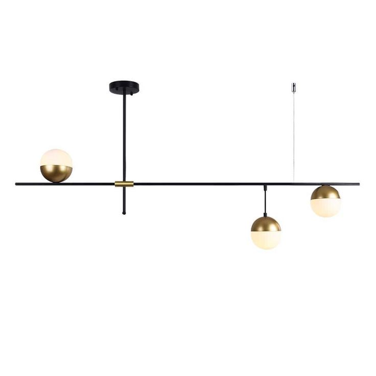 three lights that are hanging from a long black bar with two balls on each end