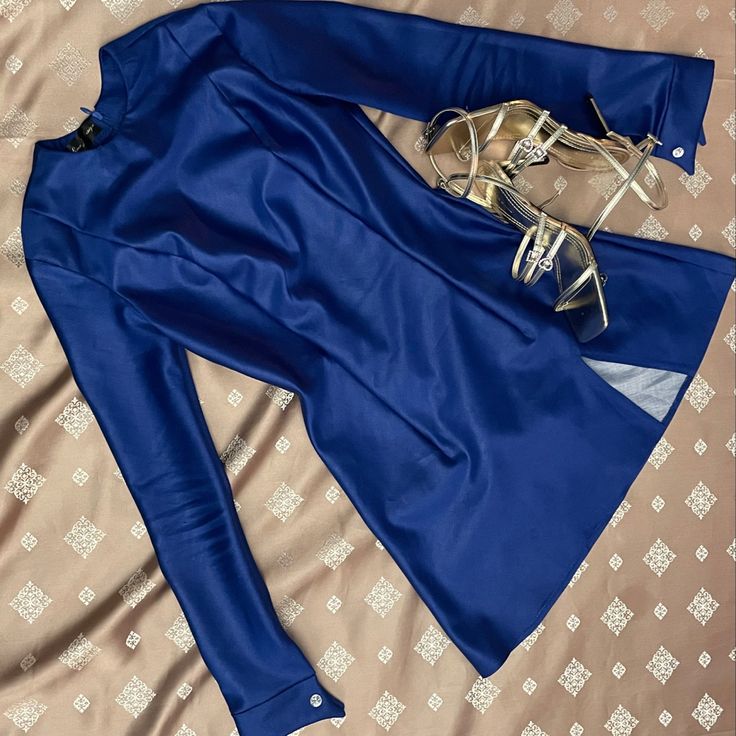 royal blue, electric blue, gold, sandals, strappy sandals, fancy outfit, designer, designer dress, a line dress, long sleeve dress Satin Royal Blue Dress, Gold Outfit Aesthetic, Gold Outfit, Royal Blue Dress, Dress Gold, Gold Sandals, Outfit Aesthetic, Gold Dress, Blue And Gold