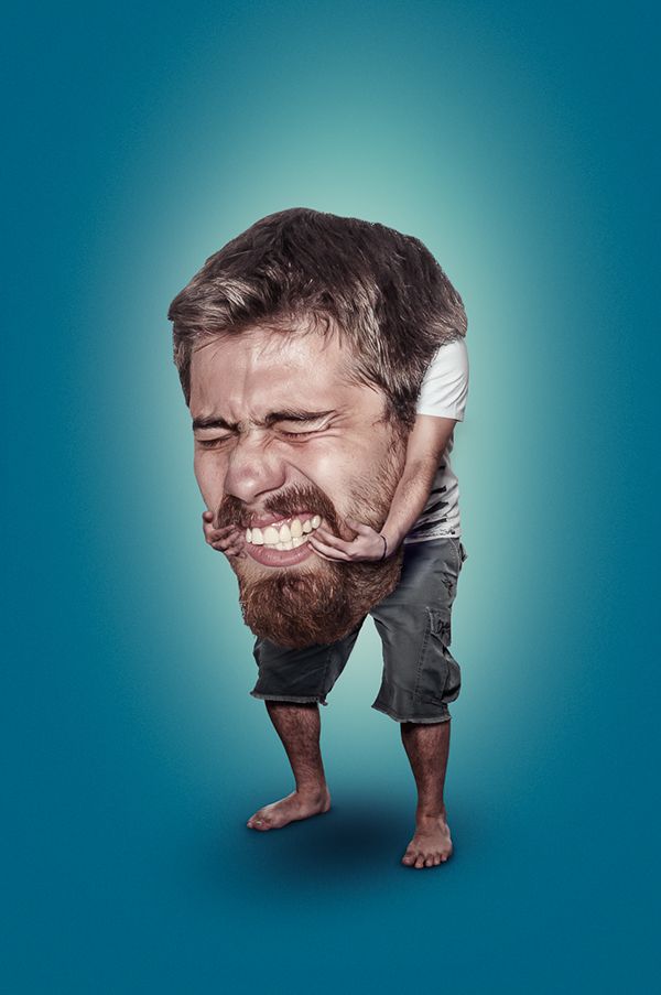 a man with a beard standing on his head