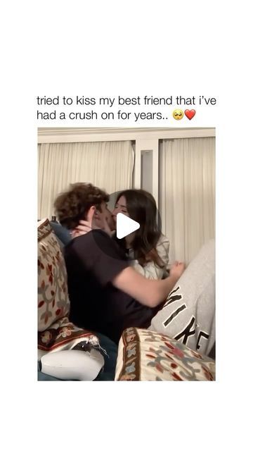 a man and woman hug each other while sitting on a couch with the caption, i tried to kiss my best friend that i've had a crush on for years