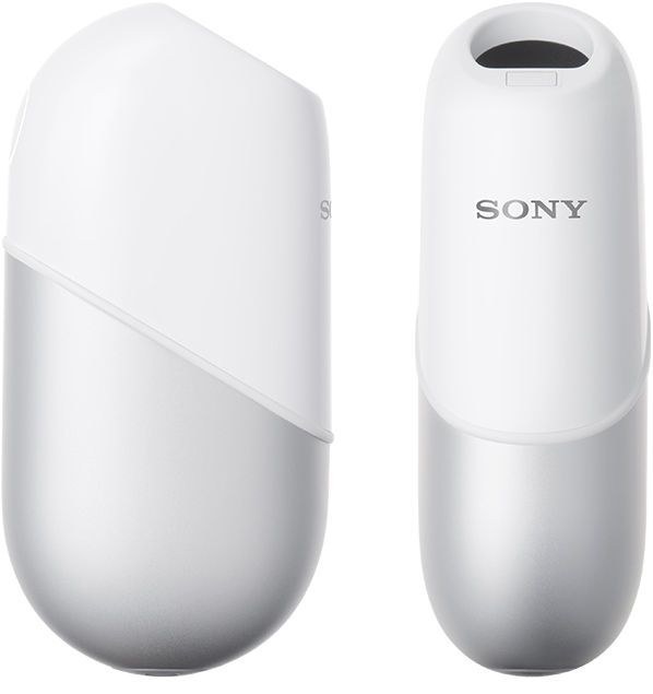 an image of two electronic devices that are white