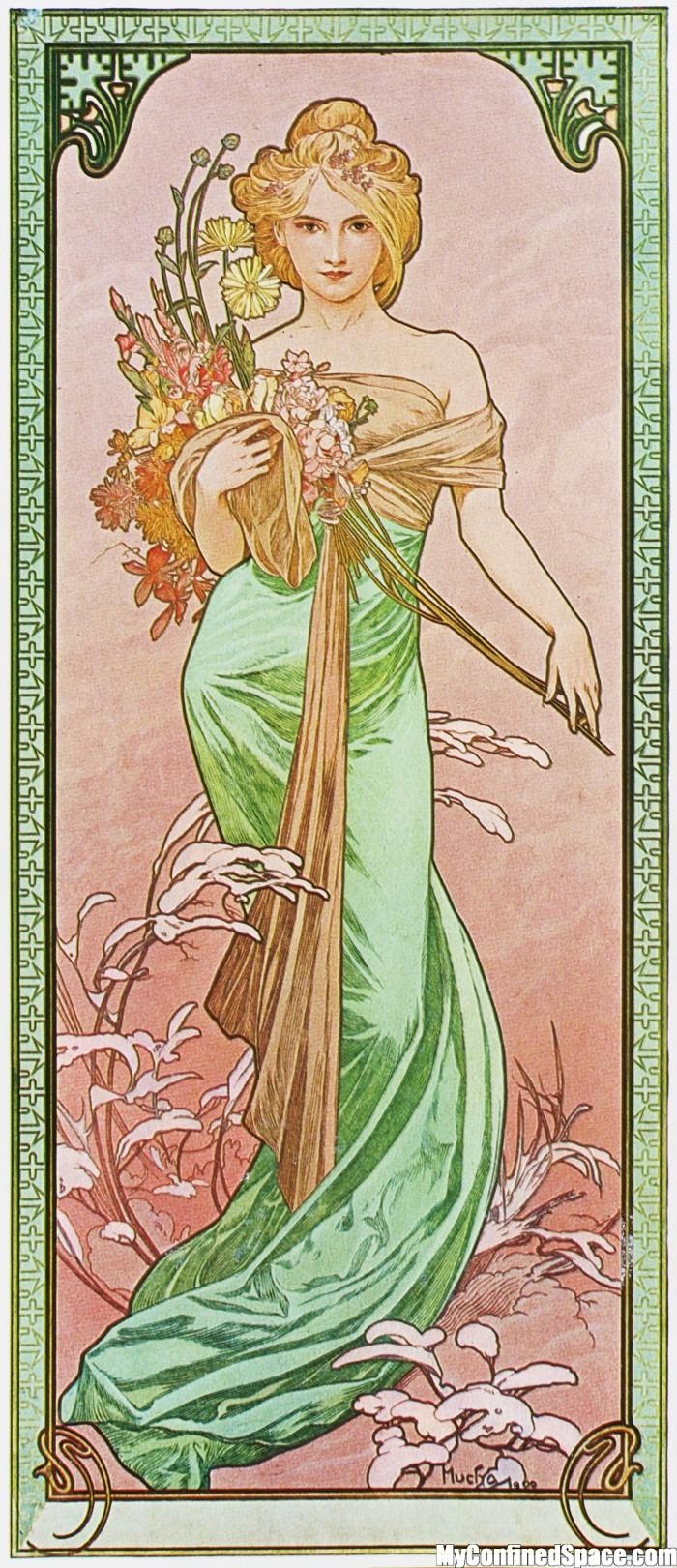 a woman in a green dress holding flowers