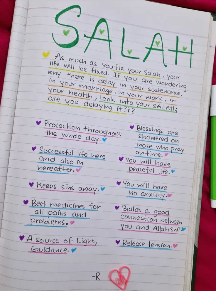 an open notebook with writing on it that says salah