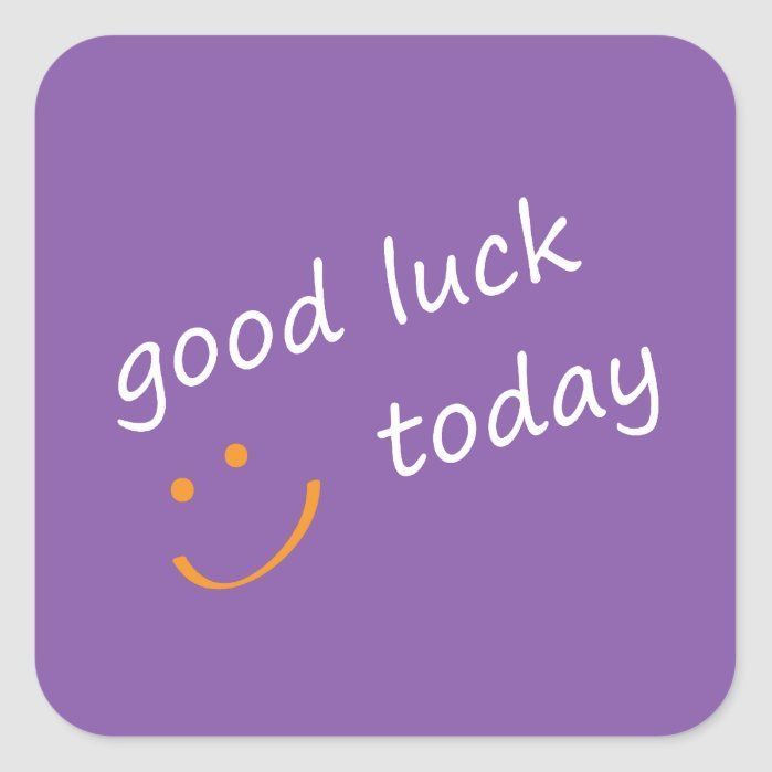 the words good luck today on a purple square sticker with an orange smiley face