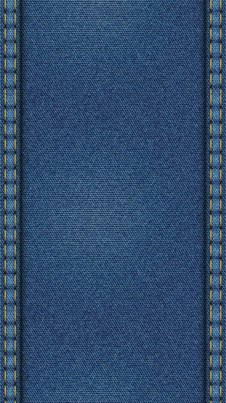 the back side of a blue jeans background